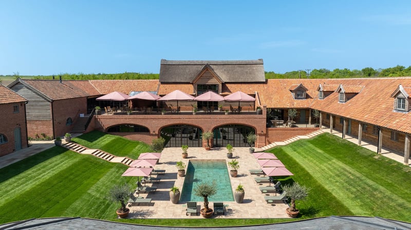 arial shot of a wedding venue with swimming pool.
