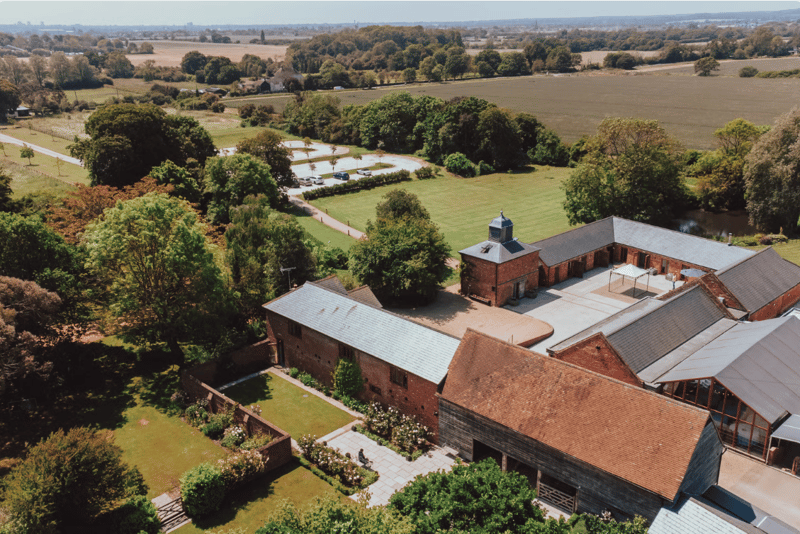 cinematic aerial view of the wedding venue 