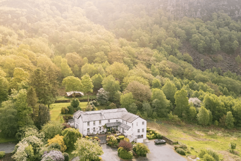 aerial view of the wedding venue exterior, surrounded by greenery