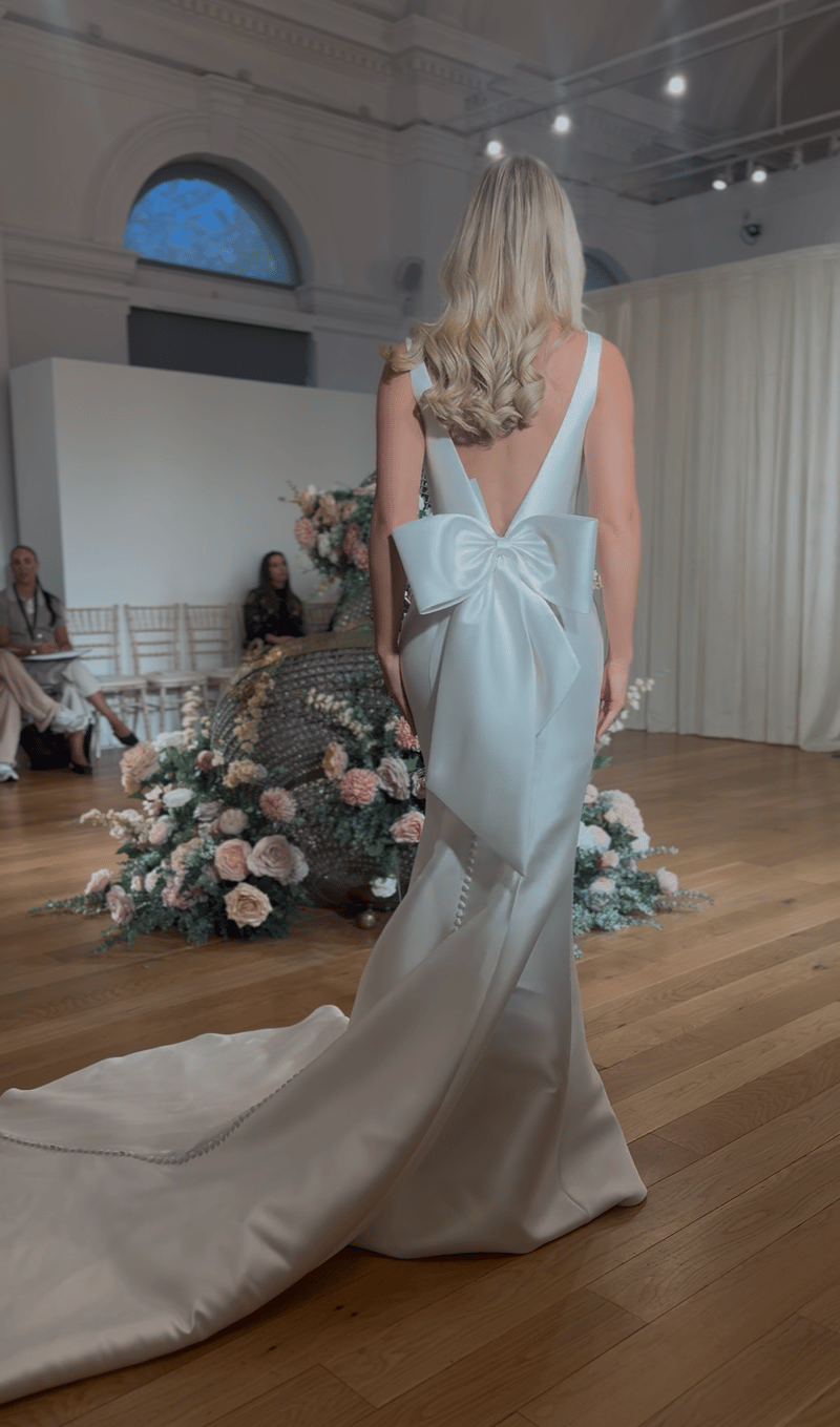 Wedding dress with a bow on the back