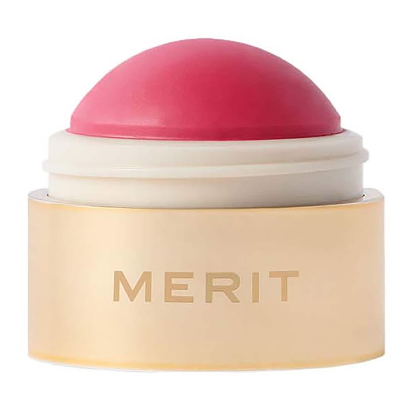 a packshot of an open cream blusher stick.