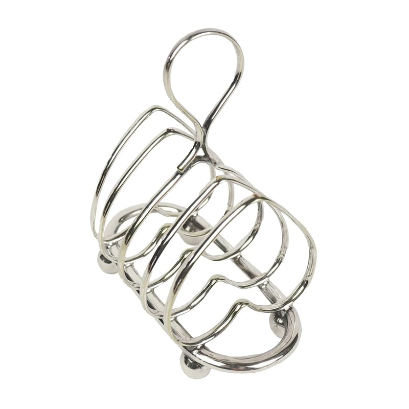 a silver plated, heart-shaped toast rack.