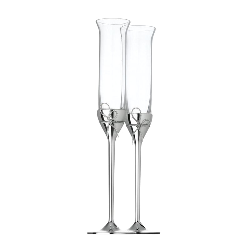 two silver plated champagne flutes with silver box detail.