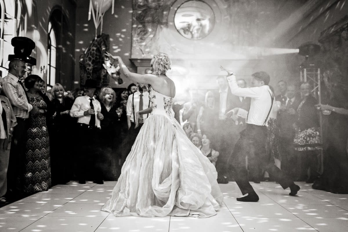 Bridebook.co.uk- bride and groom doing the thriller for their first dance