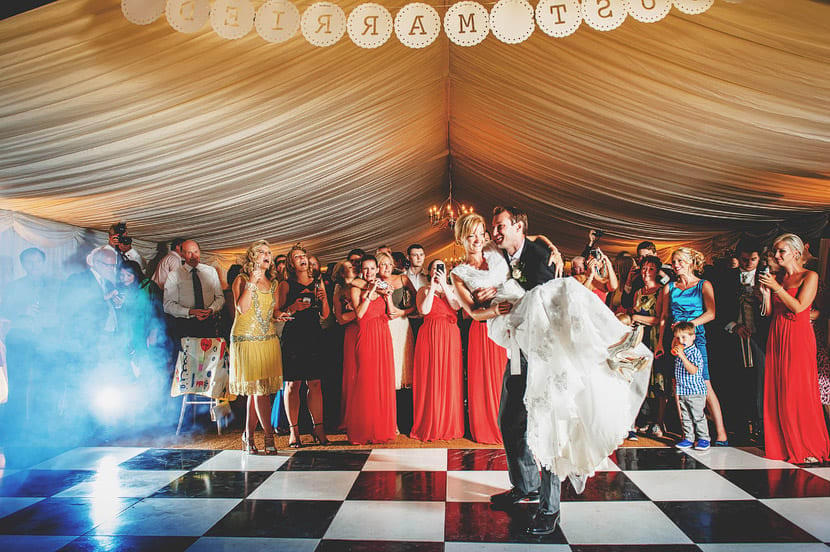 Bridebook.co.uk- groom lifting the bride during first dance