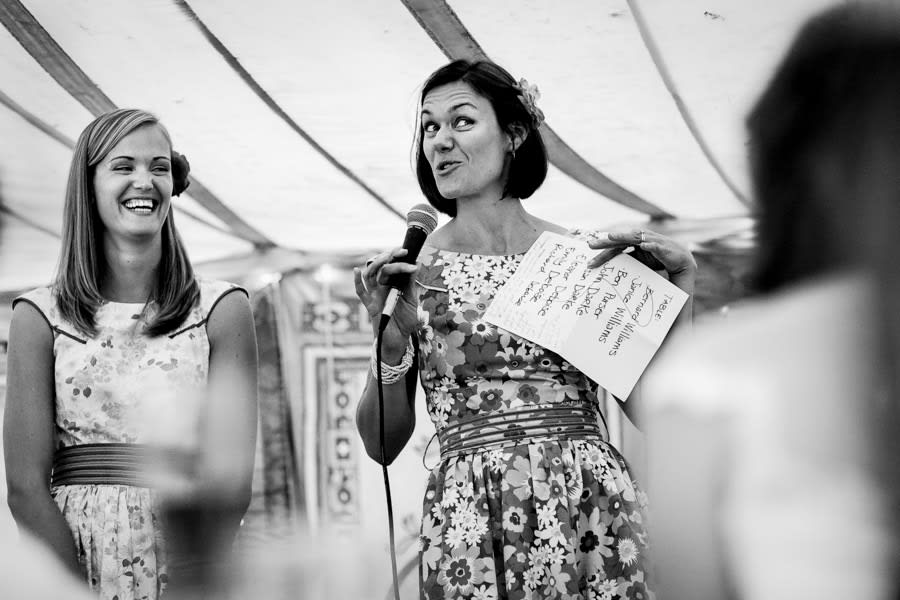 Bridebook.co.uk- maid of honour holding sheet and giving speech