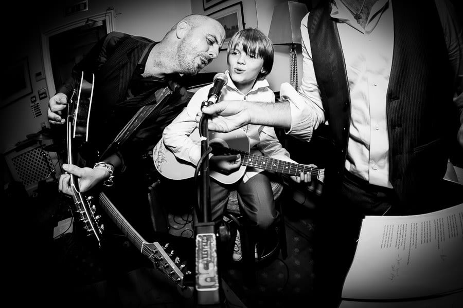 Bridebook.co.uk- wedding band performing as little boy sings along