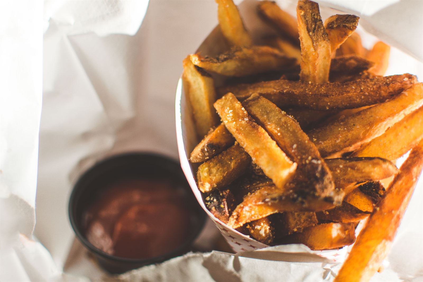 French fry cone with tomato ketchup dip served at wedding