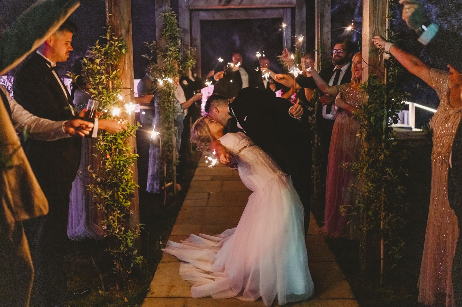 Faye and Adam Hughes in the church getting married