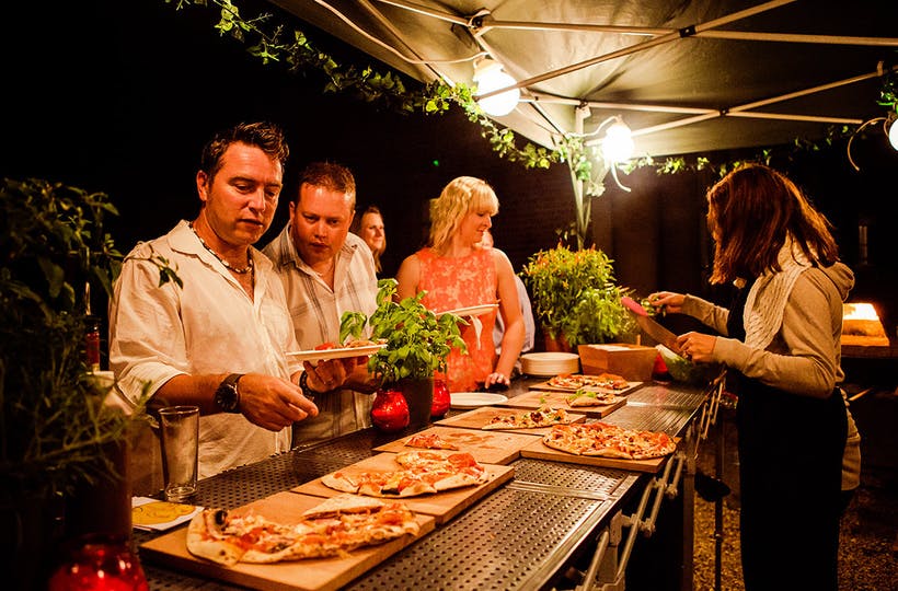 Pizza bar serving mouth-watering pizzas at wedding