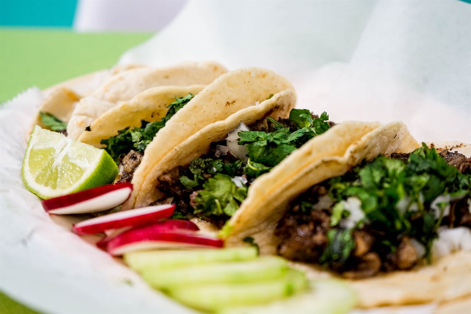 Delicious looking tacos served at tacos and nachos bar at wedding