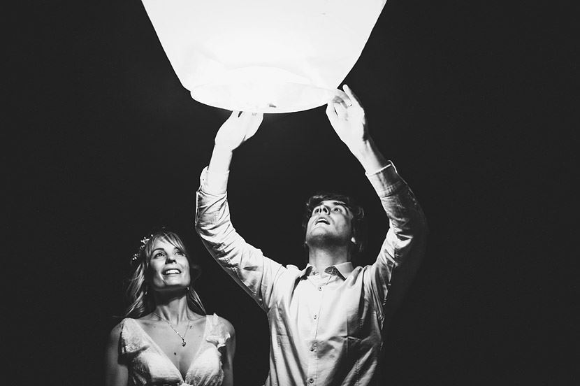 Bridebook.co.uk- bride and groom letting go of lantern