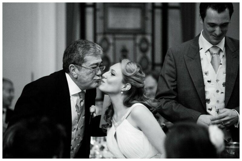 www.bridebook.co.uk bride and father sharing a kiss on the cheek