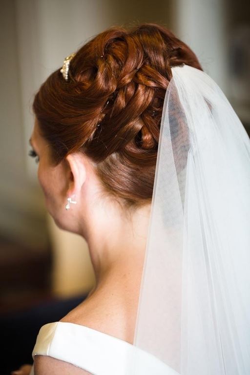 Bridebook.co.uk- bride hair in updo with veil attached