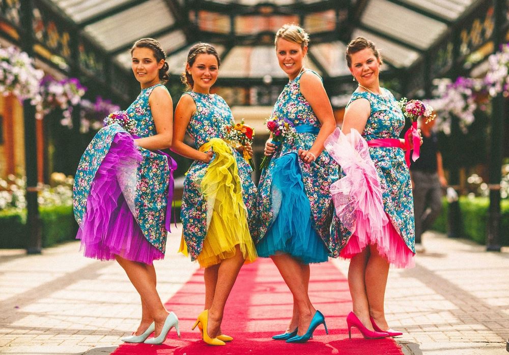 Bridebook.co.uk-bridemaids-in-colourful-dresses-by-miki-photography 