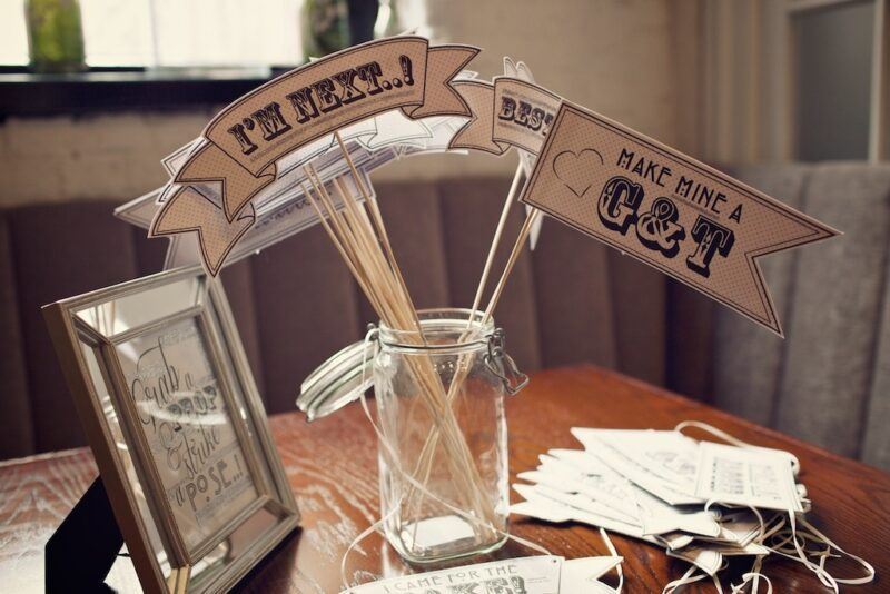 Bridebook.co.uk- flag props for ordering at the bar