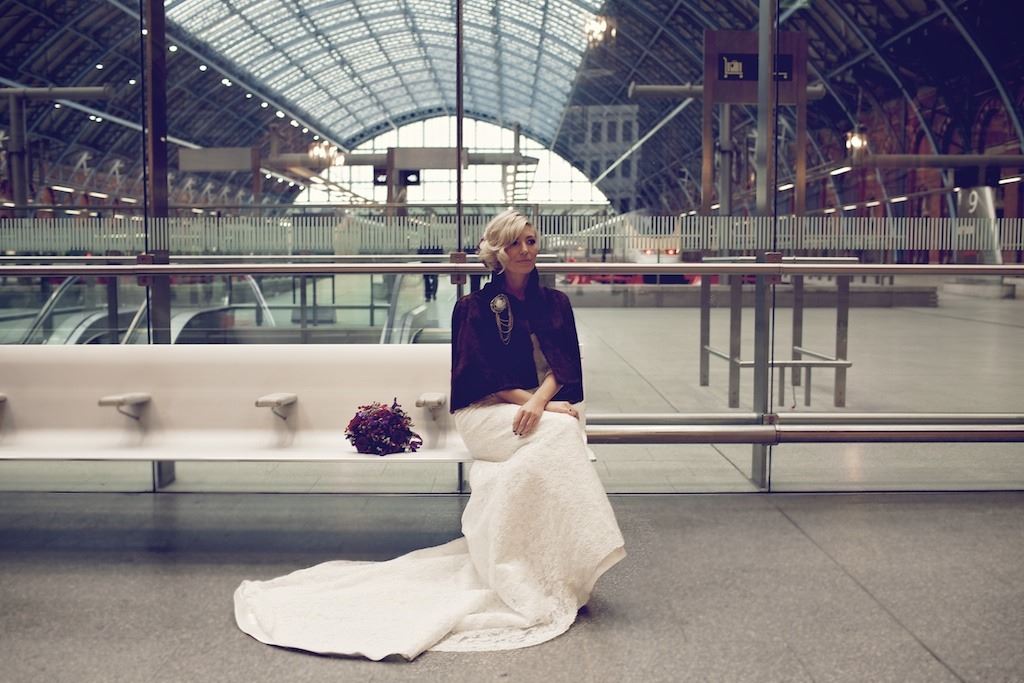 Bridebook.co.uk- bride sitting at st pancras
