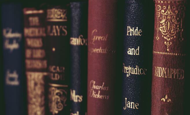 Close-up of the spines of canvas-bound second-hand books