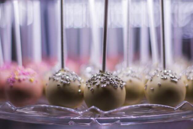 Chocolate cake pops on a glass platter