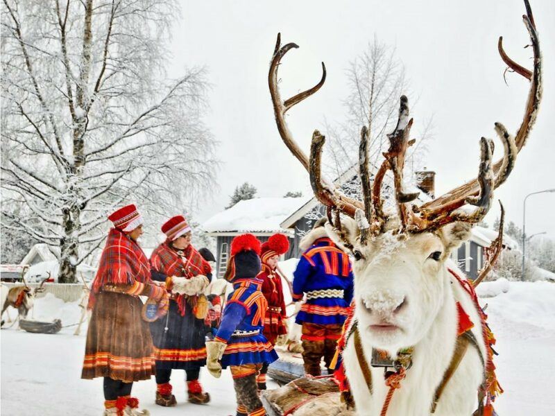 Bridebook.co.uk- reindeer sleigh and people in traditional costume