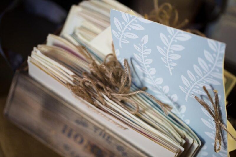 Bridebook.co.uk- rustic wedding invitations tied together with twine