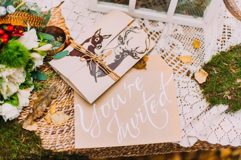 Bridebook.co.uk Wedding invitations with rustic kraft paper calligraphy 