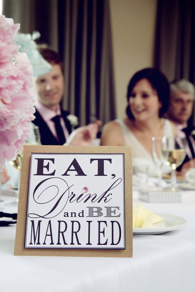 Bridebook.co.uk- eat drink and be married sign on table 