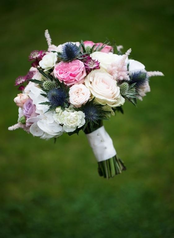 Bridebook.co.uk- hand tied bouquet with roses 