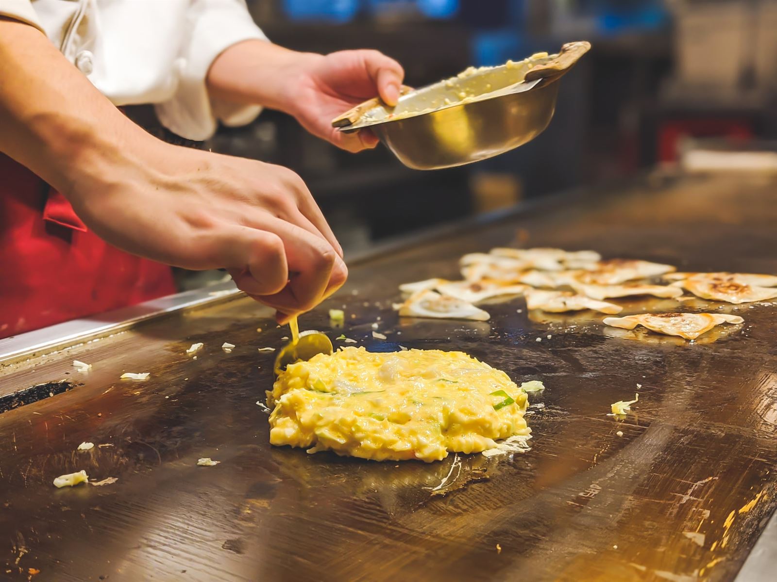 Omelette bar at wedding with person making delicious omelettes