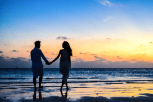Couple on a romantic beach honeymoon