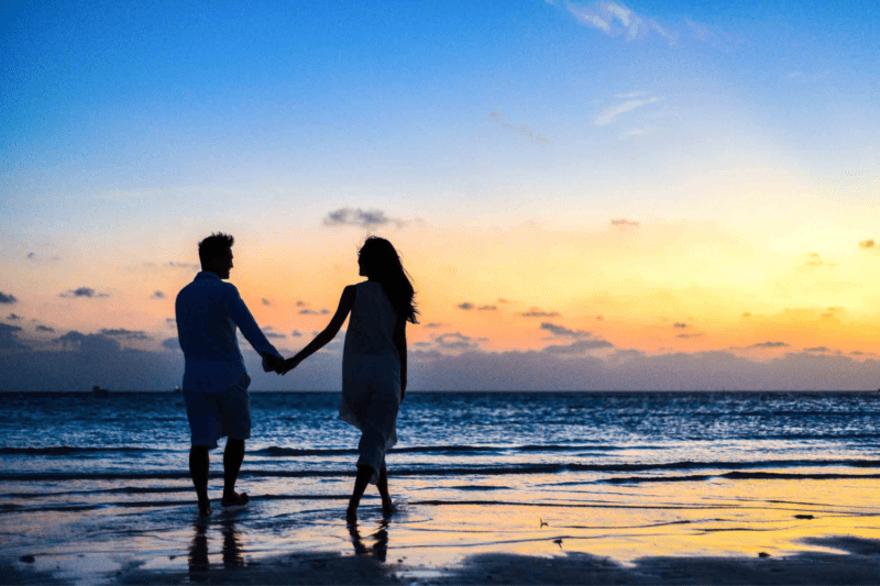 Couple on a romantic beach honeymoon