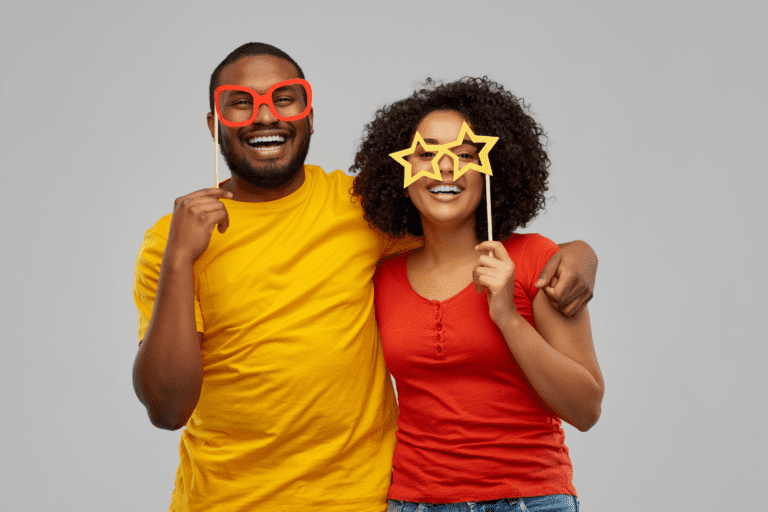 Couple wearing costume sunglasses