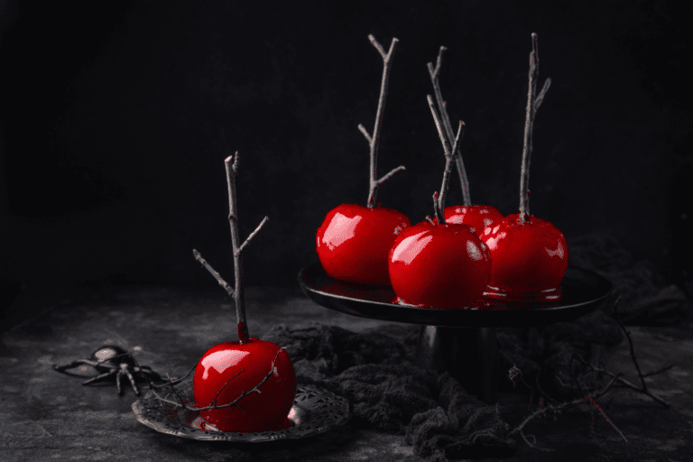 Halloween-themed blood-red toffee apples