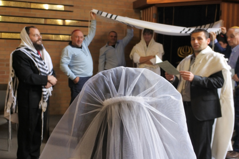 Traditional Jewish wedding bride wearing veil