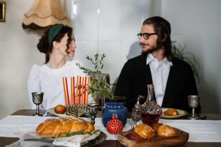 Jewish couple eating a traditional meal