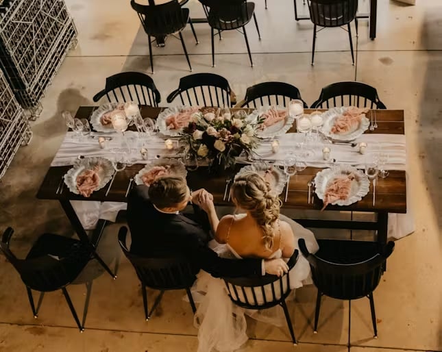 Married couple at a wedding table