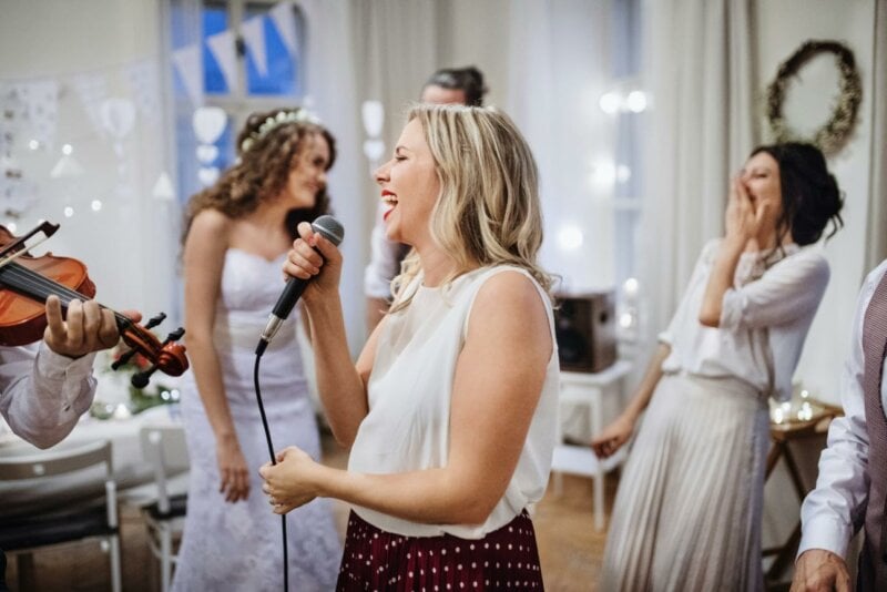 Woman giving a speech and laughing