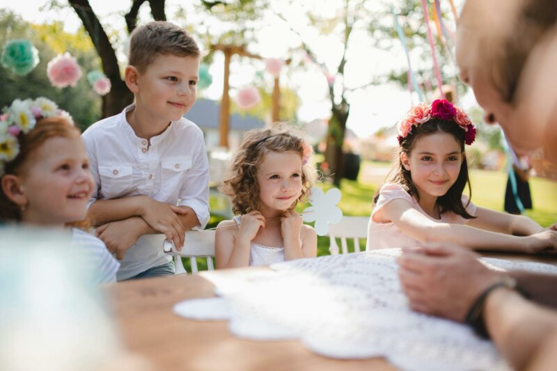 Page boy and girls with flowers at a wedding