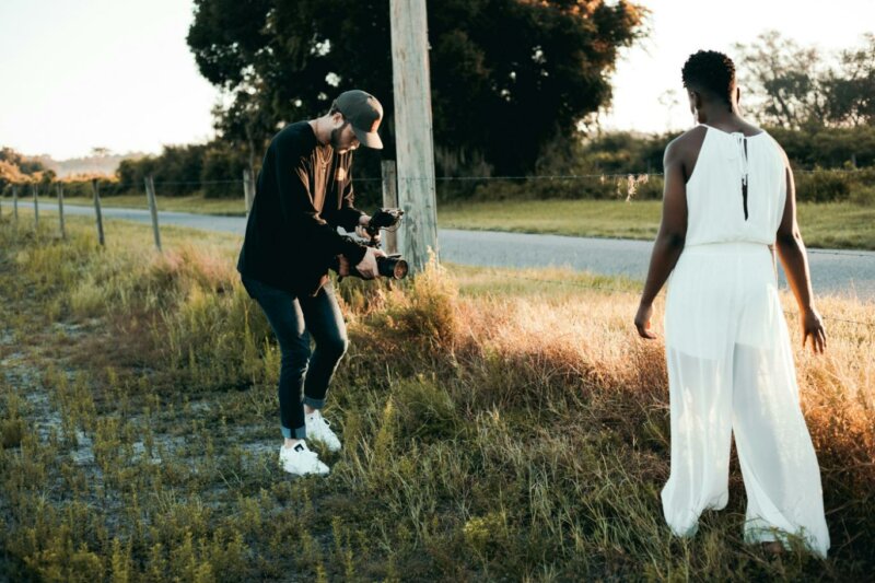 Wedding videographer filming the bride