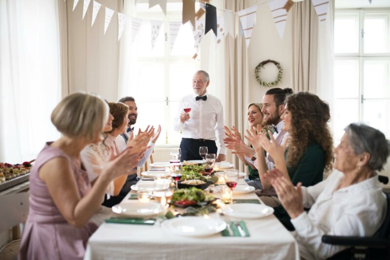 Father giving a speech at an engagement party