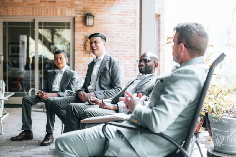 Groom and best men sitting