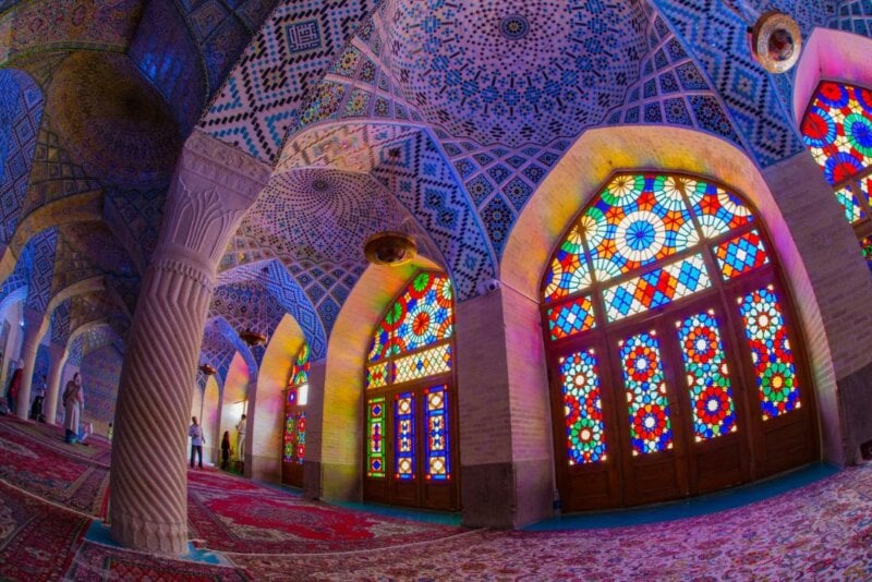 Lit interior of a colorful Mosque