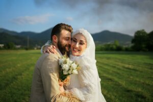 Smiling Muslim couple at their wedding