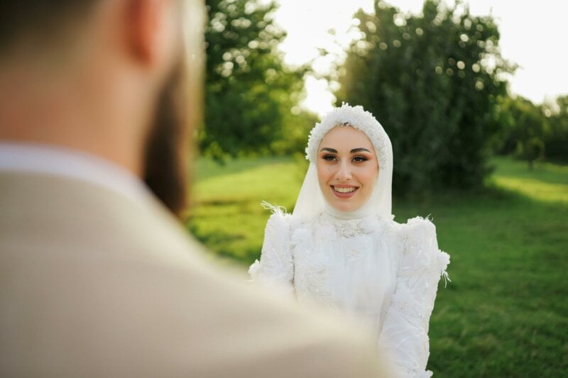 Muslim bride smiling at the groom