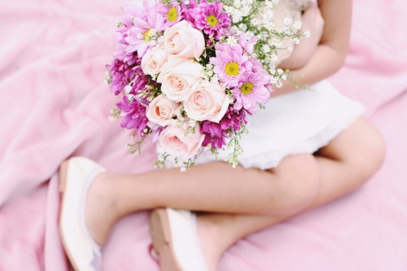 Little girl with bouquet