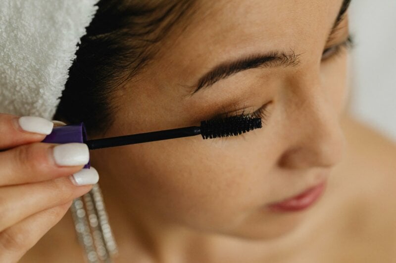 Bride doing her own makeup