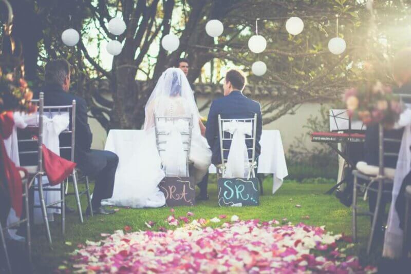 Couple sitting for a wedding ceremony