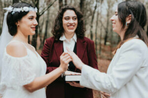 Couple with a wedding celebrant