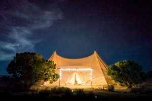 Lit up tent at night