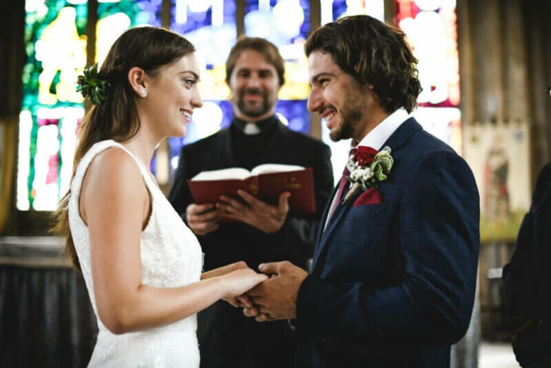 Couple with a religious wedding officiant